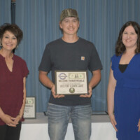 WIlhoit Lawn Care. (l-r): Chamber Director Sheila Williams, Lane Wilhoit, and Carrie Cross.