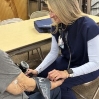 Sierra Dicken, RN from Horizon Health Emergency Dept offering free blood pressure checks. Sierra Dicken, RN from Horizon Health Emergency Dept offering free blood pressure checks.